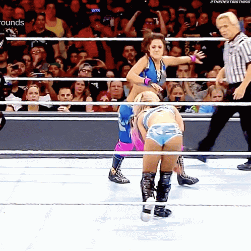 Woman in Wrestling Ring with Rounds