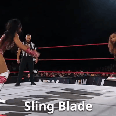 Woman in Wrestling Ring with Sling Blade