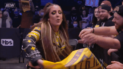 Woman In Wrestling Ring With TBS Logo GIF