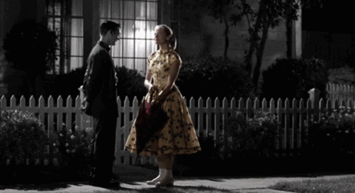 Woman In Yellow Dress Holding Pink Plaid Umbrella GIF