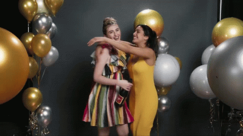 Woman In Yellow Dress Hugging GIF