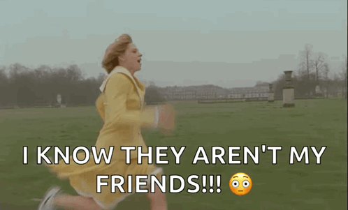 Woman In Yellow Dress Running Through Grassy Field GIF