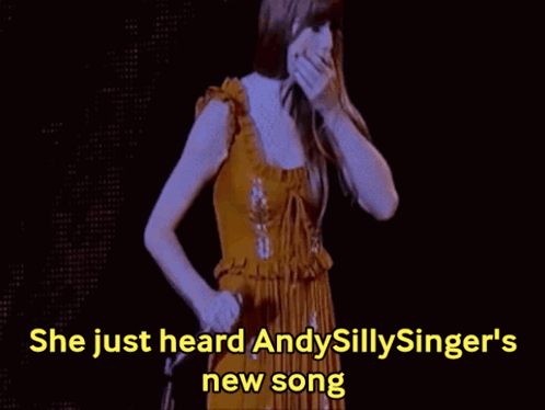 Woman In Yellow Dress Singing She Just Heard Andysillysinger's New Song GIF