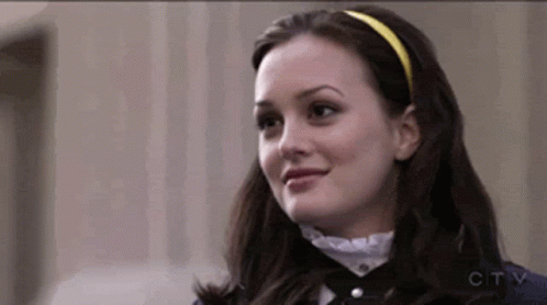 Woman in Yellow Headband Smiling