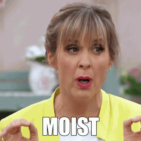 Woman In Yellow Jacket Funny Face Moist GIF