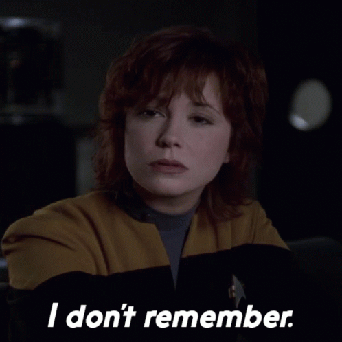 Woman In Yellow Jacket Saying I Don't Remember GIF