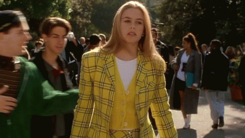 Woman in Yellow Plaid Jacket Walking