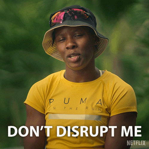 Woman in Yellow Puma Shirt