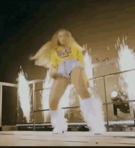 Woman In Yellow Shirt And Shorts Dancing GIF