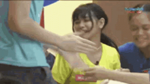 Woman In Yellow Shirt Slapped By Man GIF