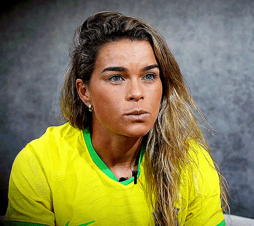 Woman in Yellow Shirt With Green Trim