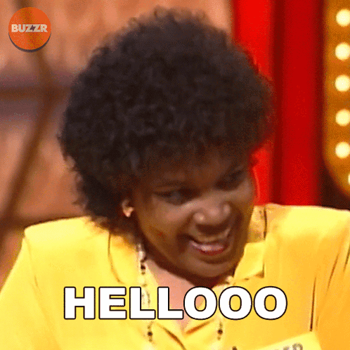 Woman in Yellow Suit Saying Hellooo