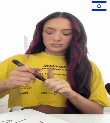 Woman In Yellow Summer Tour Shirt GIF