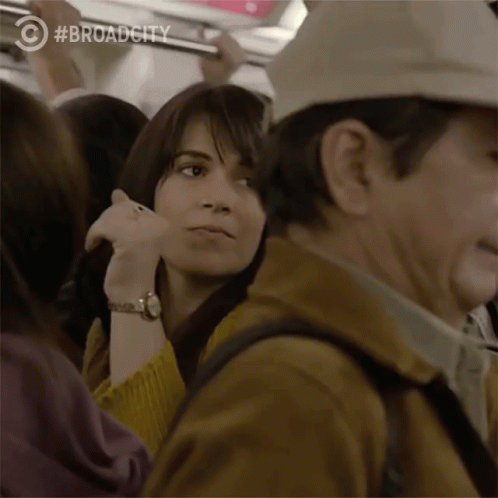 Woman in Yellow Sweater on Train