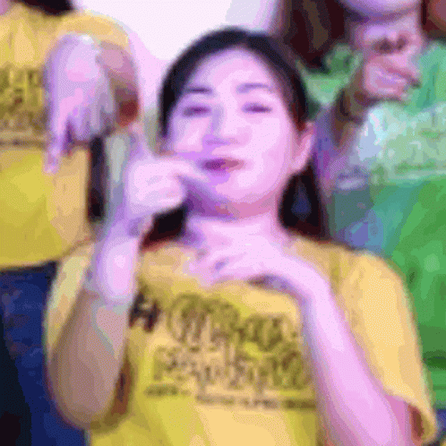 Woman in Yellow T-Shirt Making Funny Face