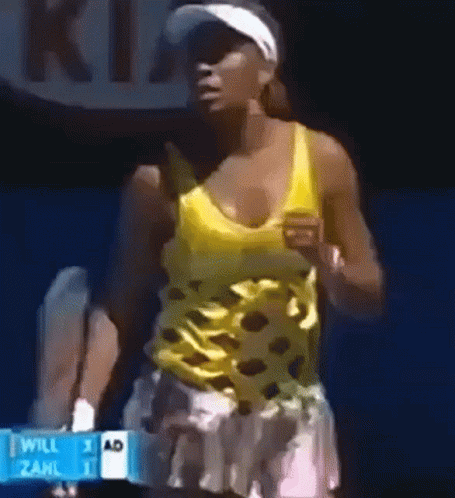 Woman in Yellow Tank Top Running on Tennis Court