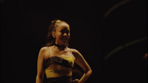 Woman In Yellow Top Dancing GIF