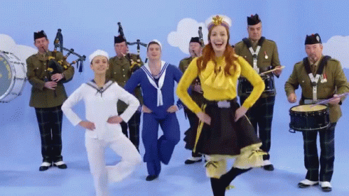 Woman in Yellow Top Dancing with Band