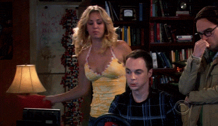 Woman in Yellow Top Standing Next to Man