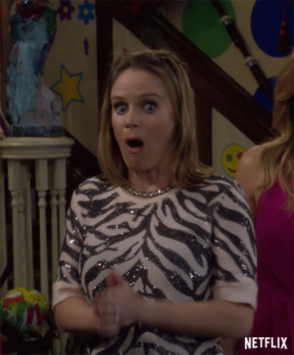 Woman in Zebra Top in Front of Netflix