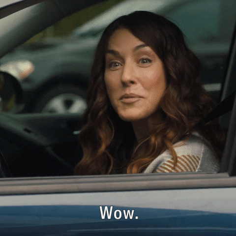 Woman Inside Car Wowza Nodding GIF