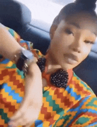 Woman Inside The Car Flexing Watch GIF