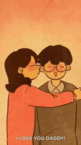 Woman Kissing Boy on Cheek