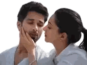 Woman Kissing Man on Cheek