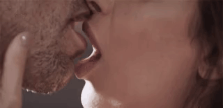 Woman Kissing Man on Cheek
