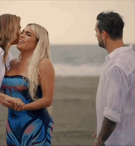 Woman Kissing Woman as Man Watches