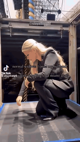 Woman Kneeling In Front Of Miss My Husband Sign GIF