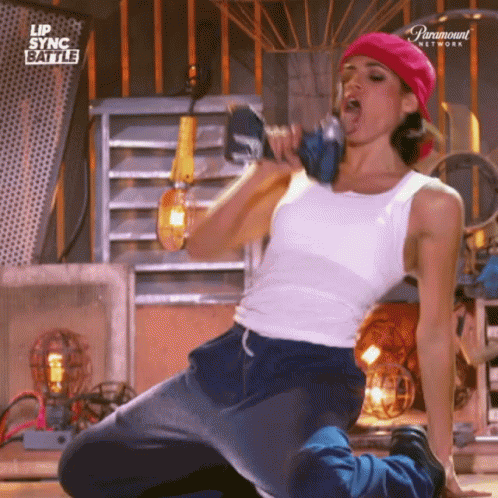 Woman Kneeling With Drill Lip Sync Battle