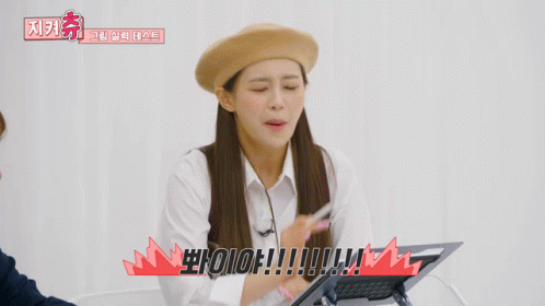Woman Laughing and Screaming at Iioioio Sign
