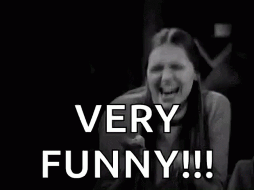 Woman Laughing in Black and White Photo Saying Very Funny