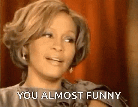Woman Laughing Saying You Almost Funny Red Curtain GIF