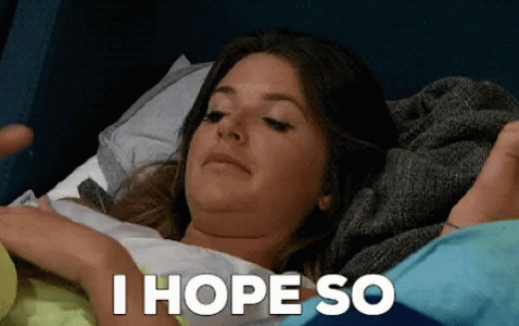Woman Laying in Bed Saying I Hope So