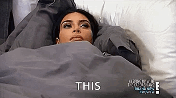 Woman Laying In Bed Under Blanket Saying This GIF