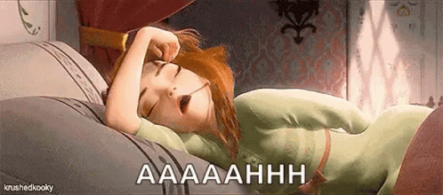 Woman Laying in Bed With Mouth Open