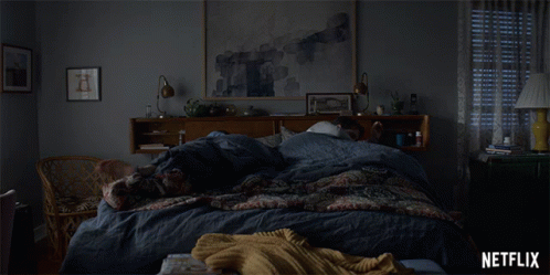 Woman Laying on Bed Netflix Ad