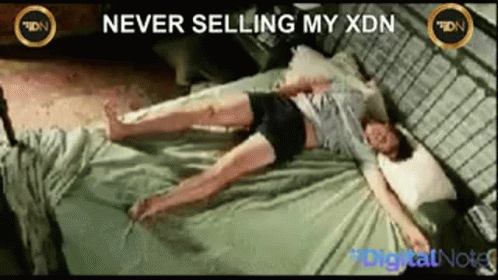 Woman Laying on Bed Never Selling My XDN