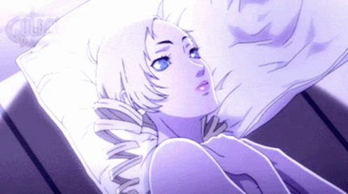 Woman Laying on Bed With Clover
