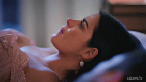 Woman Laying on Bed With Editsmaita
