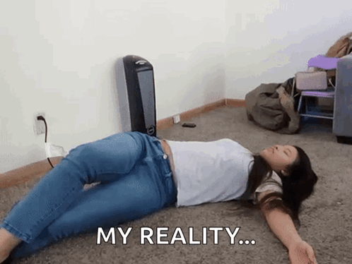 Woman Laying on Floor Arms Outstretched My Reality