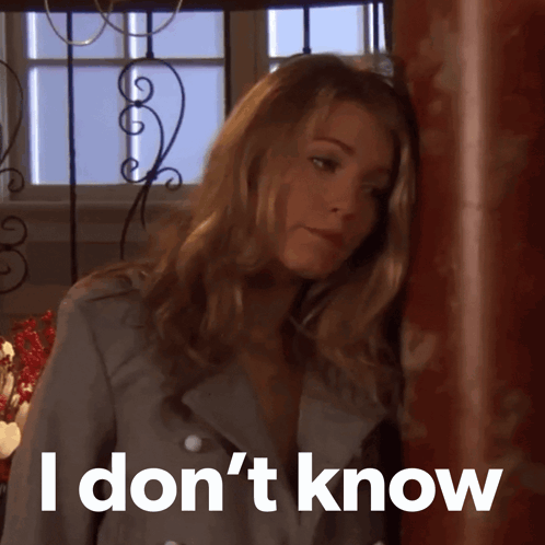 Woman Leaning Against Wall Saying I Don't Know