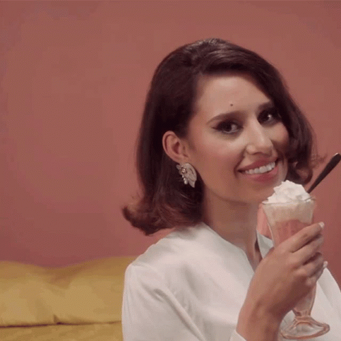 Woman Licking Whipped Cream GIF