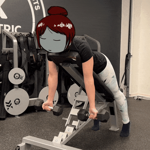 Woman Lifting Dumbbell in Front of Tric Sign