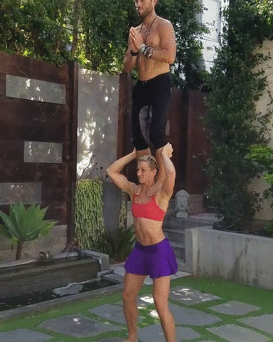 Woman Lifting Man Squats GIF