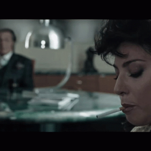 Woman Lighting Up And Smokin GIF