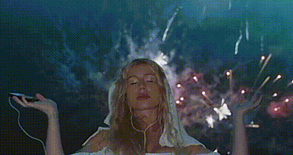 Woman Listening to Music Watching Fireworks