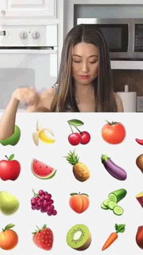 Woman Looking at Fruit and Vegetables
